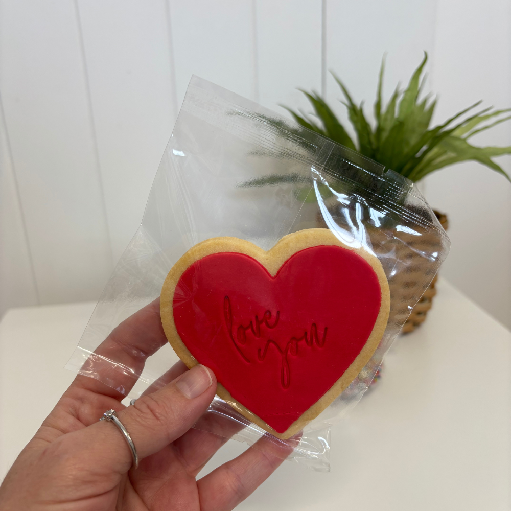 Valentines Day Gift idea Cookie with red heart that says love you
