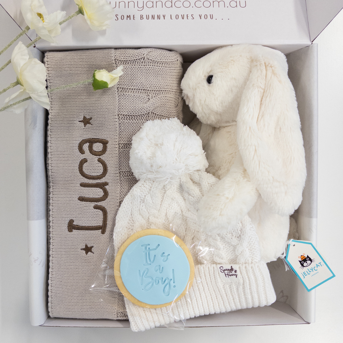 Baby gift set with plush Jellycat Bashful bunny in cream white, personalised custom knitted blanket, and white beanie in box for gift shower or birth gift