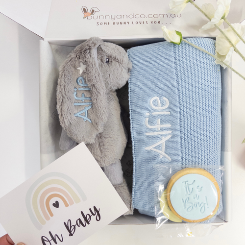 New Baby boy Gift set with personalised  bunny rabbit, baby blanket, and card in a box, featuring 'Alfie' on the items.