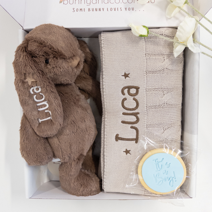 Plush personalised bunny teddy and personalised baby blanket set with 'Luca' embroidered, in a baby shower birth announcement gift box.