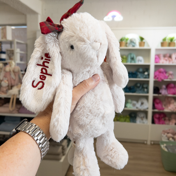 Personalised Jamie Kay Snuggle Bunnies bunny rabbit with name personalized on ear and red bow on ear christmas bunny 