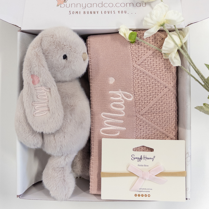 Gift set for baby girl with personalised plush bunny, pink baby blanket, and card in a box, featuring 'bunnyandco.com.au' branding.